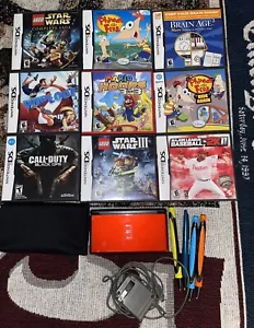 NINTENDO DS LITE IN RED WITH CHARGER AND 9 GAMES WORKING MINT CONDITION - Picture 1 of 7