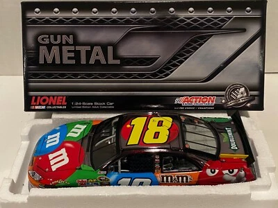 KYLE BUSCH #18 2011 M&MS GUN METAL 1/24 - Image 1 of 4