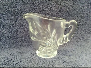 INDIANA GLASS CREAMER, CLEAR GLASS WITH LEAF DESIGN & RIBBED HANDLE - Picture 1 of 5