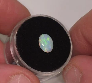 Australian Coober Pedy opal. 9 x 7mm. 0.9ct. Oval. Natural solid opal - Foto 1 di 5