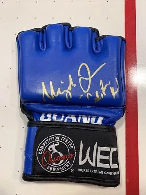 УРИЯ ФАБЕР *ПОДПИСАННАЯ* WEC Ouano Официальная БОЕВАЯ ПЕРЧАТКА Автограф Кали Кид UFC MMA - Изображение 1 из 2