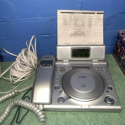 Coby Cd RA 185 Fijo Tell, Reproductor de CD, Radio AM/FM Reloj Digital Doble Alarma Foto 1 de 3