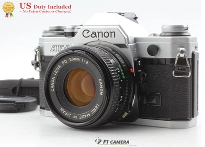 [Near MINT] Canon AE-1 SLR 35mm Film Camera NFD New FD 50mm f/2 Lens From JAPAN - Image 1 of 4