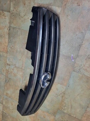 Infiniti G35 G35x 2005 a 2006 sedán parrilla superior delantera OEM 62070 AC500 700 Foto 1 de 4