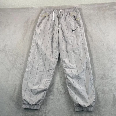 Pantalones de chándal ajustables Nike ISPA para hombre medianos grises universitarios reflectantes AOP $250 Foto 1 de 4