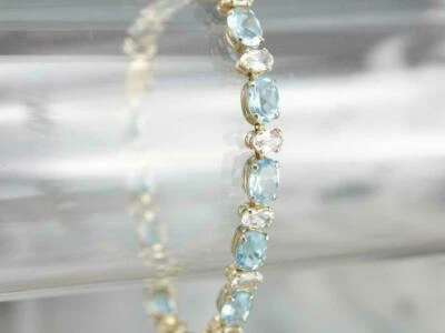 9Ct Oval Cut Simulated Aquamarine Tennis Bracelet 925 Silver Yellow Gold Plated - Image 1 of 4