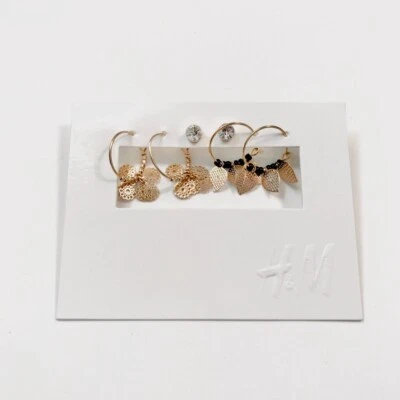 H&M ORECCHINI CERCHIO PENDENTI GIOIELLO PUNTO LUCE DORATI NUOVI - Immagine 1 di 2