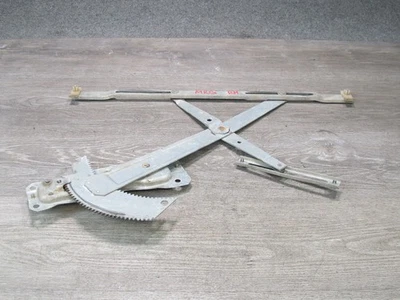 84-85 MAZDA RX7 FB PUERTA PASAJERO DERECHO MANUAL VENTANA REGULADOR OEM Foto 1 de 4