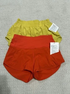 Lululemon Shorts Bundle Speed Up Hotty Hots Sz 2 & 4 Soleil Yellow Solar Orange - Picture 1 of 9