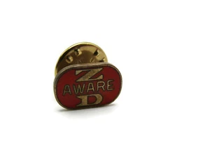 ZD Aware Pin Red Background Gold Tone Oval Shape - Picture 1 of 5