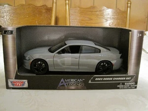 MOTORMAX AMERICAN LEGENDS PREMIUM DIE CAST 2023 CARICATORE DODGE SXT SCALA 1:24 - Foto 1 di 14