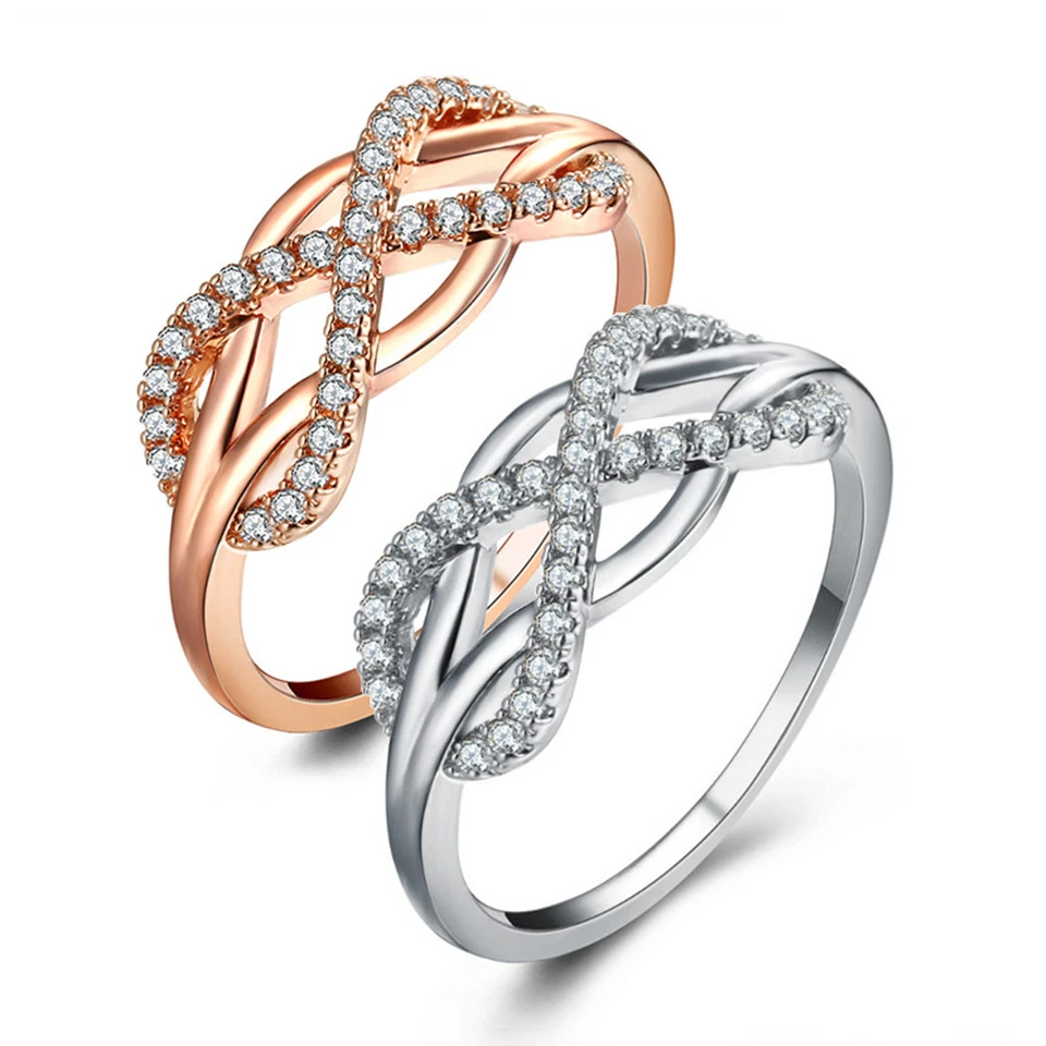 Edelstahl Ring Unendlichkeit Infinity Zirkonia silber rosegold Schleife Damen - Bild 1 von 1