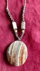 Peruvian necklace woven in macrame thread and natural stone