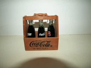 Six Minature Coca Cola Bottles in a Minature 1930s Style Carrier - Picture 1 of 6