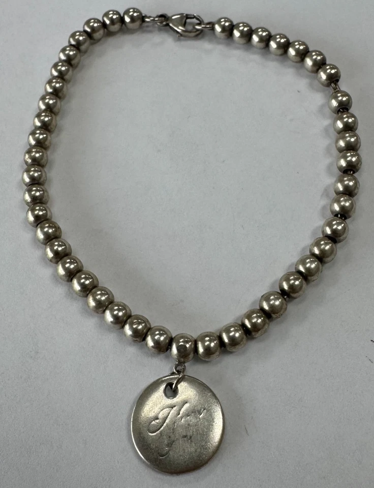 Pulsera Tiffany & Co Plata de Ley 4mm Cuentas "Te Amo" Etiqueta Redonda [105GCS] Foto 1 de 4