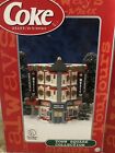 NIB Coca Cola Town Square Building, "Marty's Music Shop and Coin-Op Laundry"