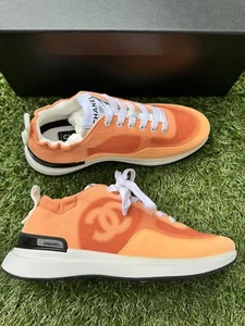 Tenis de entrenadores Chanel de gamuza piel de becerro naranja neón logotipo CC 36,5 nuevas con etiquetas - Imagen 1 de 12