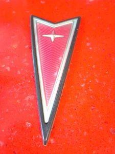 97 98 99 00 01 02 03 Pontiac Grand Prix—Front Fascia Red Arrow Badge Emblem - Picture 1 of 5