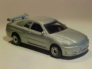 Nissan Skyline GT-R Motormax #6028 1/64 1999 diecast vintage de 3 pulgadas como nuevo suelto - Imagen 1 de 6