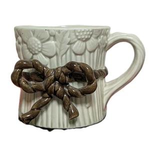Taza de café vintage 1975 Fitz & Floyd flor blanco roto ramo floral lazo marrón - Imagen 1 de 6