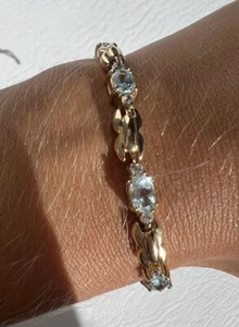 "Brazalete de tenis Han Thai de plata de ley 925 firmado tono dorado con topacio azul 7,5""" - Imagen 1 de 9