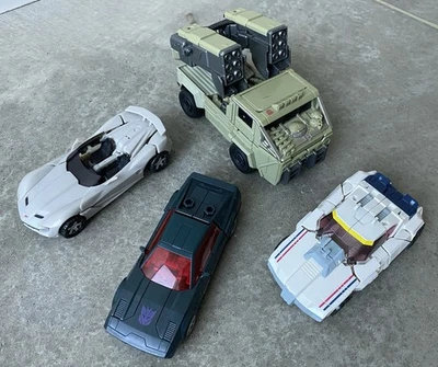 Transformers Vehicles Mixed LOT (4) Hound, Wild Rider, Breakaway, Sideswipe - Image 1 of 4