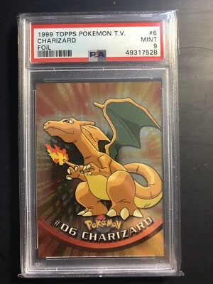 Charizard 1999 Topps Pokemon T.V. #6 Foil Black Logo PSA 9 “Rays” pattern - Image 1 of 2