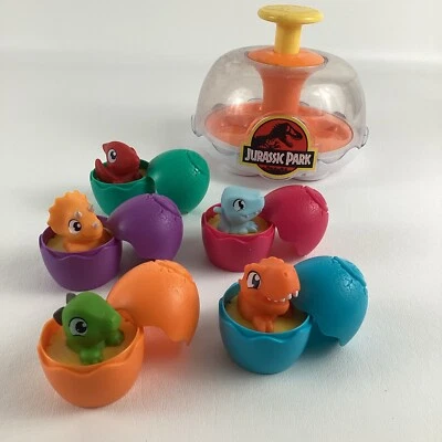 Jurassic Park Tomy Toomies Spin & Hatch Dino Huevos Actividad Juguete Dinosaurio Niño Pequeño Foto 1 de 4