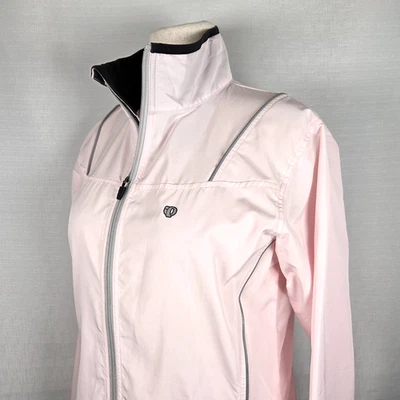 Jaqueta corta-vento feminina Pearl Izumi rosa claro ciclismo grande leve - Imagem 1 de 4
