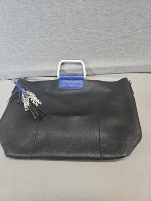 Bolso de cuero negro Cirque Du Soleil borla cebra (C8) Foto 1 de 4