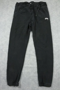 Pantalones deportivos Stussy para hombre XL negros de vellón con logotipo de stock bolsillos con puños - Imagen 1 de 11