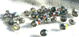600 Stck., 4 mm Tschechisch Feuerpoliert Rund Facettiert Glasperlen - SCHWARZ DURCHM. VITRAIL - Bild 1 von 2