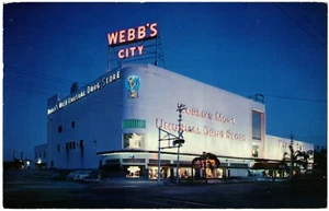 Postal de St. Petersburg, FL Webb's City Most Unusual Drog Store, Night, Florida - Imagen 1 de 2