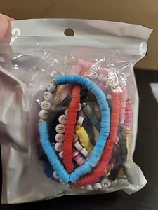 Taylor Swift Armband 12 Stück Stretch Mehrfarbig Epochen Swifties 1989  - Bild 1 von 3