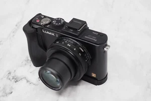 Panasonic Lumix DMC-LX7 impugnatura, fotocamera impugnatura pollice integrata NON inclusa - Foto 1 di 9