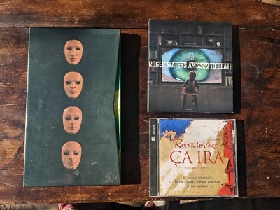 CHOOSE One from drop down menu...roger waters pink floyd cd the wall ca ira to Foto 1 de 4