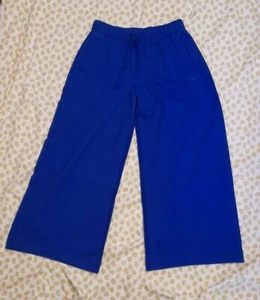 Pantaloni tuta Adidas versione blu gamba larga fondo donna taglia 14uk rari nuovi - Foto 1 di 9