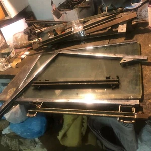 LOT 1957 CADILLAC POSSIBLE BUICK FRONT GLASS FRAMES MISC CHANNEL INNER DR PARTS - Picture 1 of 7