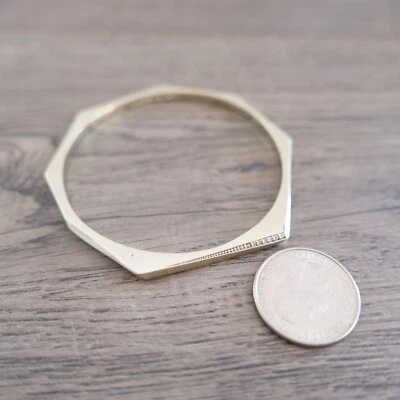 Brazalete Kendra Scott Aubrey tono dorado y piedras circonitas!!! Foto 1 de 3