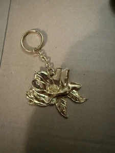 Portachiavi fiore oro - Foto 1 di 1