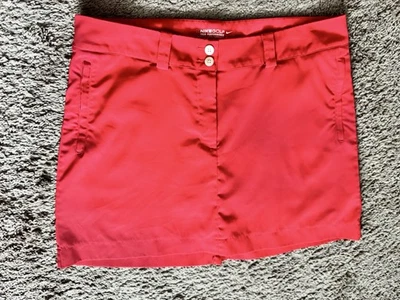 Falda corta Nike Golf Dri-Fit para mujer talla 12, rosa intenso Foto 1 de 4