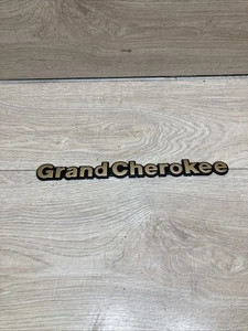 Jeep Grand Cherokee gold side fender emblem badge decal logo OEM Genuine Stock - Picture 1 of 3