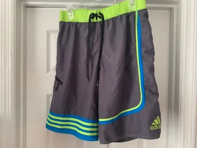 Bañador corto Adidas para hombre talla mediana forrado gris carbón azul neón Foto 1 de 4