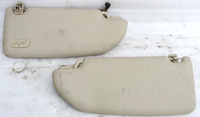 JUEGO DE PARASOLES conductor pasajero Volvo OEM CON HOMELINK S60 V70 XC70 01-09 vinilo tostado Foto 1 de 4