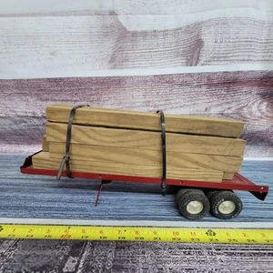 Vintage Nylint pressed steel Flatbed semi trailer w/wood load red - Picture 1 of 9
