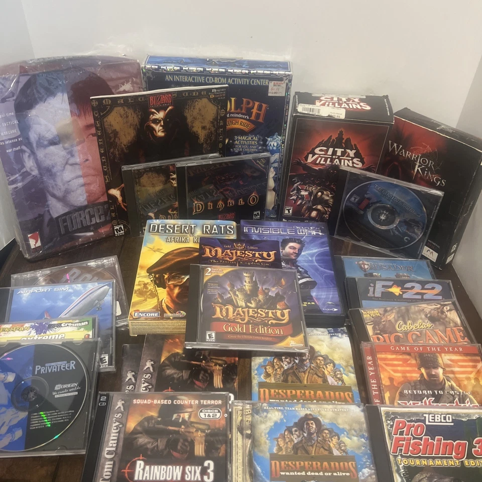 Vintage Lot of 27 PC CD-ROM Games For Windows Diablo Wolfenstien Rainbow Six 3 - Image 1 of 4