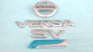 2012-2019 NISSAN VERSA SV PURE DRIVE REAR EMBLEM BADGE SYMBOL SET OEM (2017) - Picture 1 of 4