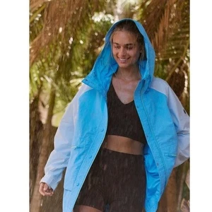 Chaqueta empaquetable Free People Singin In The Rain en bloques de colores nueva con etiquetas - Imagen 1 de 9