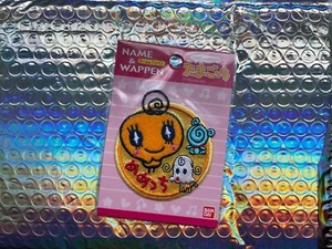 Tamagotchi Memetchi iron-on patch (2004) - original packaging unopened - Picture 1 of 2