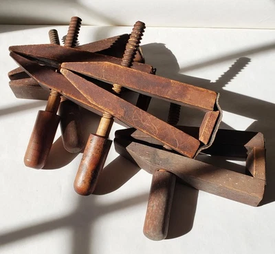 Set of 4 Antique wooden clamps wood with leather and copper nail construction - Image 1 of 4